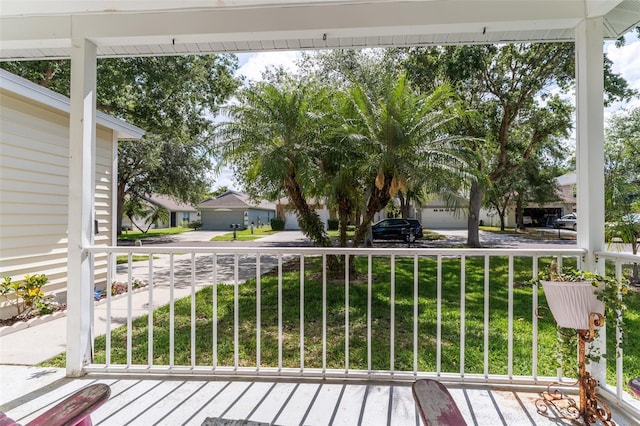 5607 Tanagergrove Way, Lithia, FL 33547 - wooden deck featuring a residential view