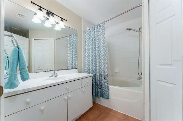 5607 Tanagergrove Way, Lithia, FL 33547 - bathroom with tile patterned floors, vanity, shower / bathtub combination with curtain, and visible vents