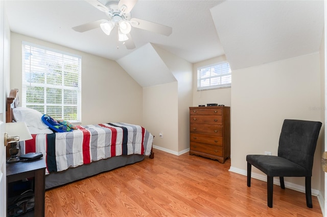5607 Tanagergrove Way, Lithia, FL 33547 - bedroom featuring light wood-style flooring, vaulted ceiling, and multiple windows