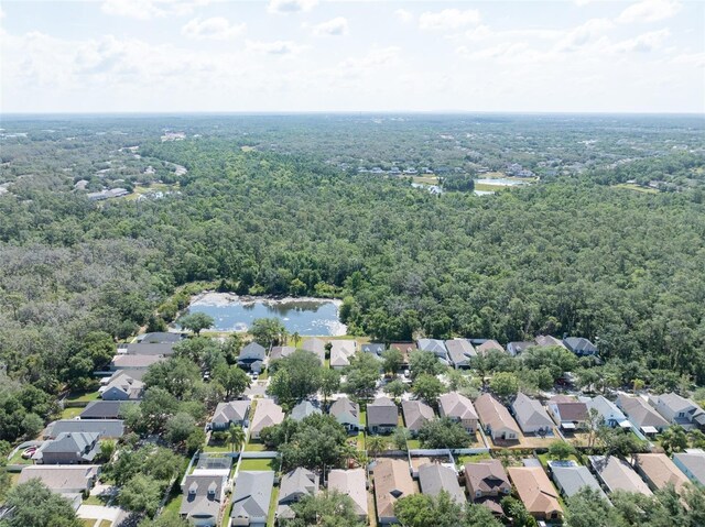 5607 Tanagergrove Way, Lithia, FL 33547 - aerial view featuring a residential view and a wooded view