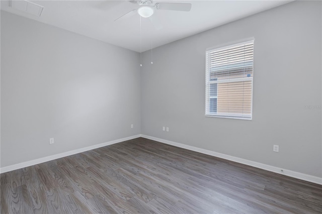 10506 Sky Flower Ct, Land O Lakes, FL 34638 - unfurnished room featuring baseboards, ceiling fan, wood finished floors, and visible vents