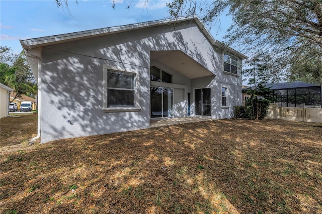 10506 Sky Flower Ct, Land O Lakes, FL 34638 - back of property featuring stucco siding