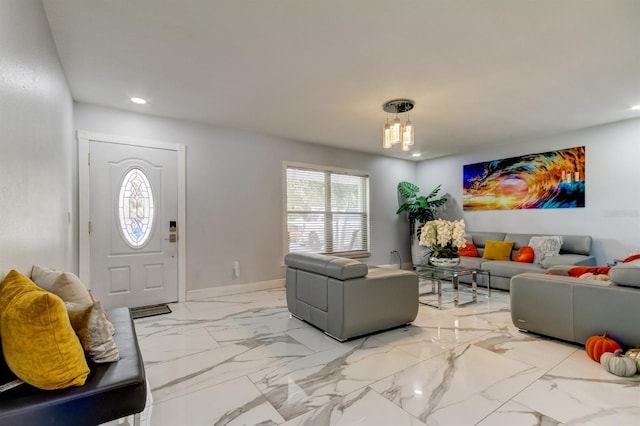 interior space with recessed lighting, marble finish floor, baseboards, and a healthy amount of sunlight