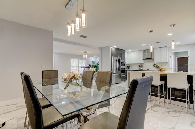 dining space with recessed lighting, visible vents, and marble finish floor