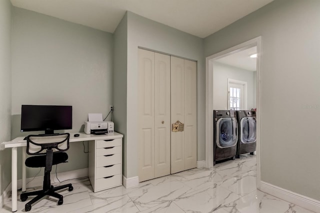 office featuring baseboards, independent washer and dryer, and marble finish floor