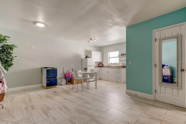dining area with baseboards
