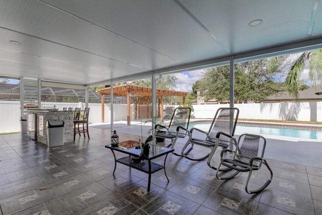 sunroom / solarium with outdoor dry bar and a wealth of natural light