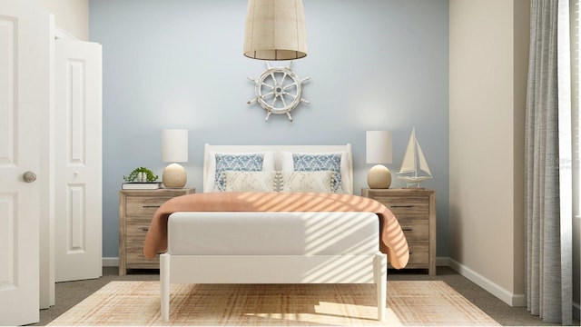 bedroom with carpet flooring and baseboards