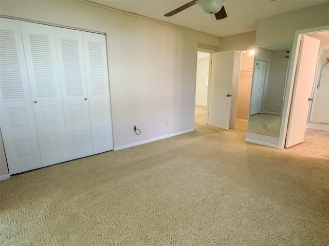 unfurnished bedroom with baseboards, ceiling fan, and carpet flooring