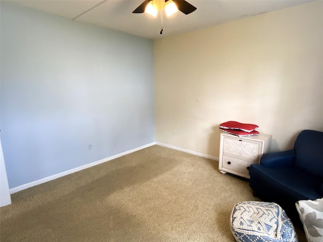 unfurnished room with carpet floors, ceiling fan, and baseboards