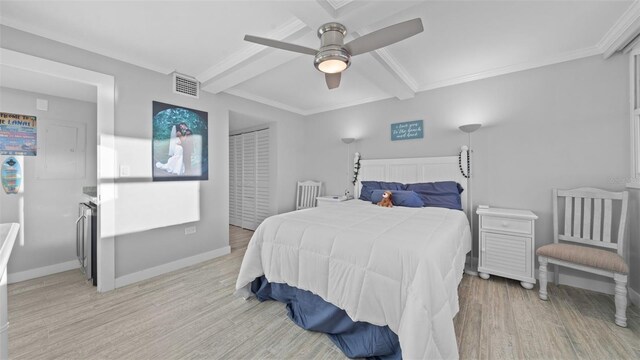 bedroom with visible vents, beamed ceiling, baseboards, a ceiling fan, and light wood finished floors