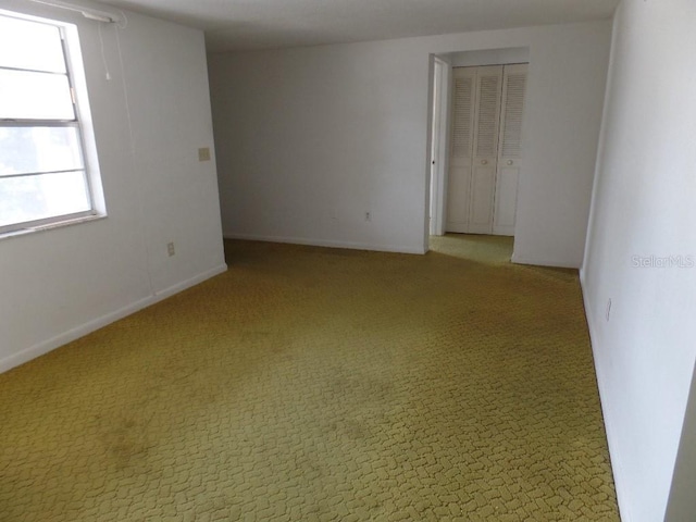 view of carpeted spare room
