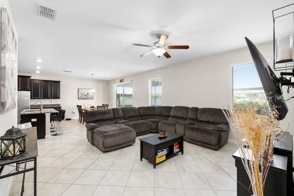11760 Winterset Cove Dr, Riverview, FL 33579 - living area with a ceiling fan, visible vents, light tile patterned floors, and recessed lighting