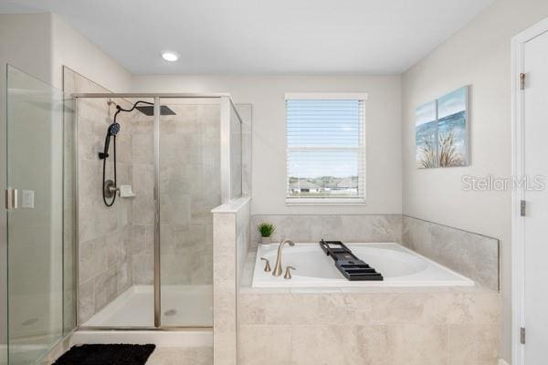 11760 Winterset Cove Dr, Riverview, FL 33579 - bathroom with a shower stall and a garden tub