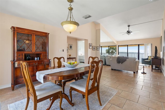 7540 Sunshine Skyway Ln S # 219, Saint Petersburg, FL 33711 - dining area featuring visible vents, ceiling fan, and lofted ceiling