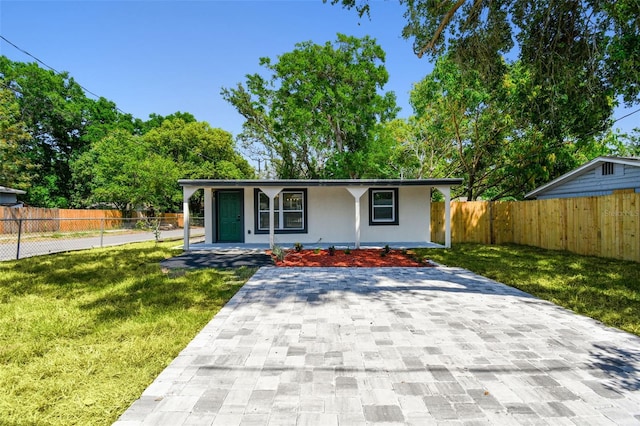 10011 N Annette Ave, Tampa, FL 33612 - view of front of property with a porch and stucco siding