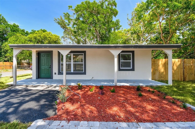 10011 N Annette Ave, Tampa, FL 33612 - single story home with covered porch and stucco siding