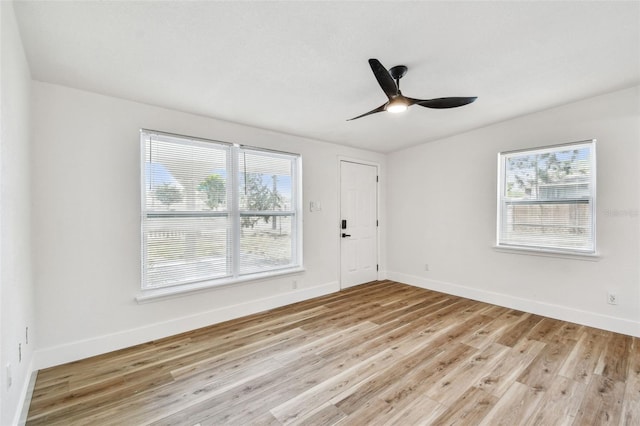 10011 N Annette Ave, Tampa, FL 33612 - unfurnished room featuring light wood-type flooring and a ceiling fan