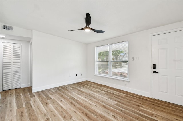10011 N Annette Ave, Tampa, FL 33612 - foyer entrance with a ceiling fan and light wood-style flooring
