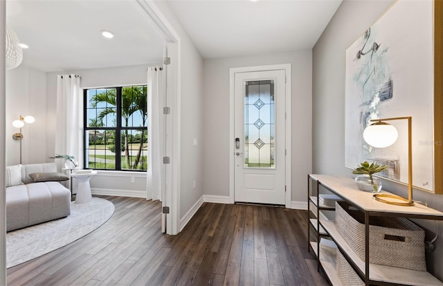 5953 Bluestar Ct, Lakewood Ranch, FL 34211 - entrance foyer with recessed lighting, baseboards, and dark wood-style floors