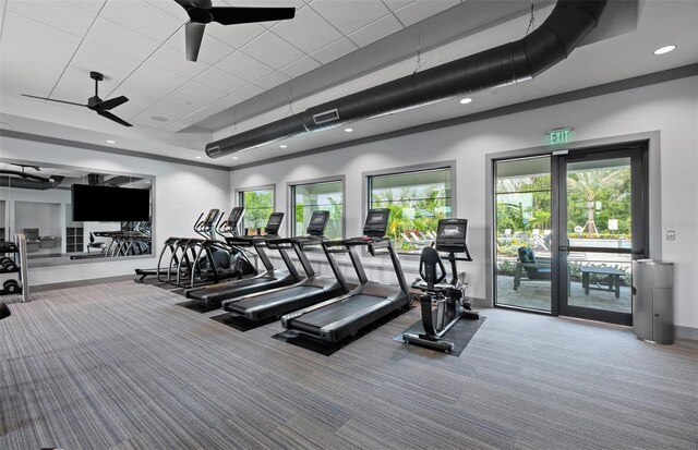 5953 Bluestar Ct, Lakewood Ranch, FL 34211 - gym featuring a tray ceiling, a ceiling fan, visible vents, carpet flooring, and recessed lighting