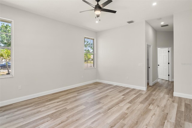 4317 74th Ave E, Sarasota, FL 34243 - unfurnished room with visible vents, a ceiling fan, light wood-style floors, and recessed lighting