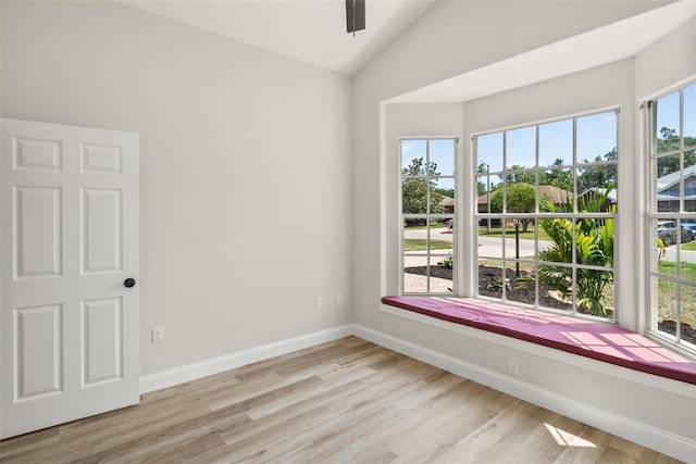 4317 74th Ave E, Sarasota, FL 34243 - spare room with a ceiling fan, baseboards, vaulted ceiling, and light wood finished floors