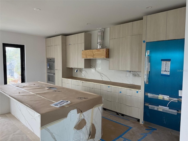 501 W Ross Ave Unit 1, Tampa, FL 33602 - kitchen featuring light brown cabinetry, double oven, backsplash, modern cabinets, and recessed lighting