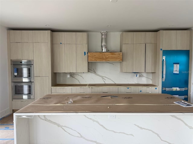 501 W Ross Ave Unit 1, Tampa, FL 33602 - kitchen featuring light brown cabinets, stainless steel double oven, and modern cabinets