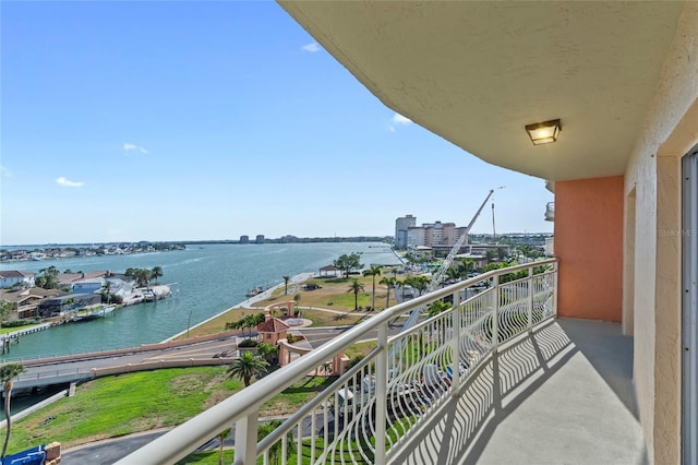 balcony featuring a water view