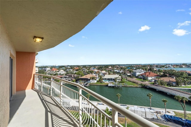 balcony featuring a water view