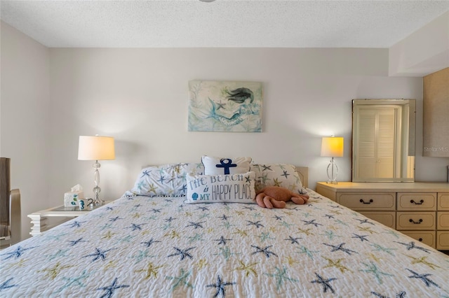 bedroom with a textured ceiling