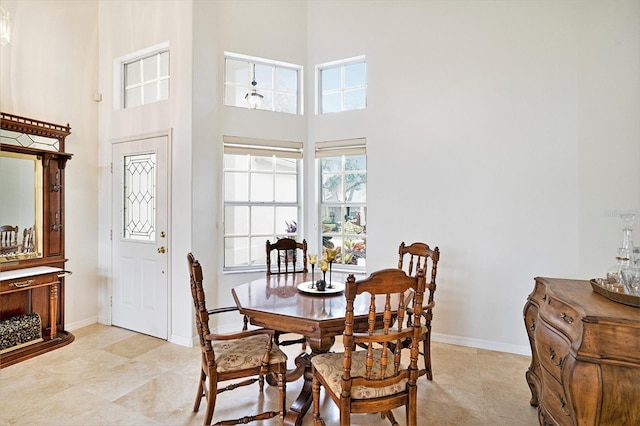 3023 Bent Creek Dr, Valrico, FL 33596 - dining room with a high ceiling and baseboards