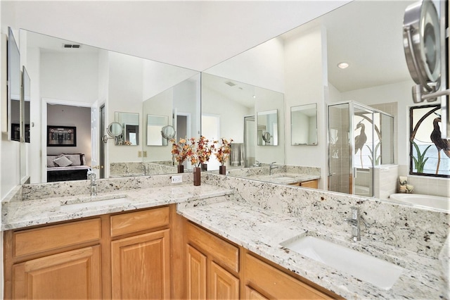 3023 Bent Creek Dr, Valrico, FL 33596 - full bathroom with a stall shower, double vanity, and a bath