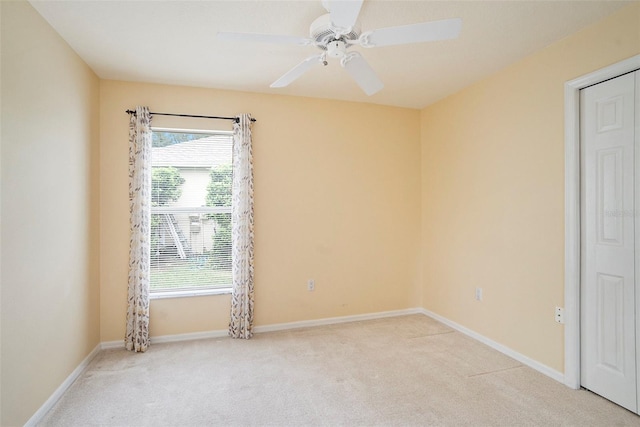 3023 Bent Creek Dr, Valrico, FL 33596 - spare room with light carpet and a ceiling fan