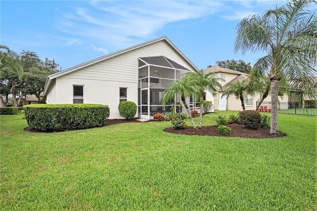 3023 Bent Creek Dr, Valrico, FL 33596 - rear view of property featuring stucco siding and a sunroom