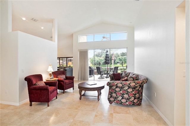 3023 Bent Creek Dr, Valrico, FL 33596 - living room featuring high vaulted ceiling and baseboards