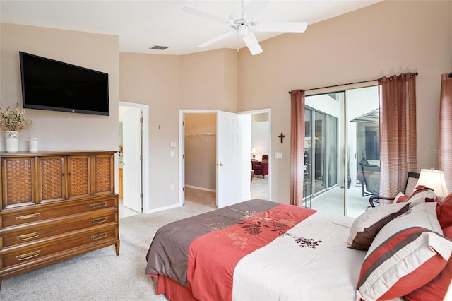 3023 Bent Creek Dr, Valrico, FL 33596 - bedroom with access to outside, light colored carpet, high vaulted ceiling, a walk in closet, and a ceiling fan