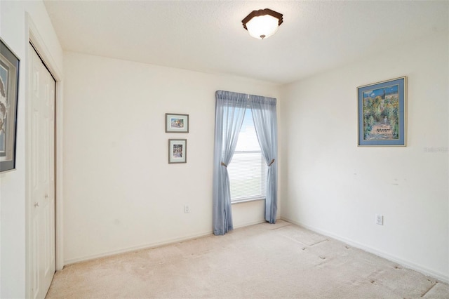 3023 Bent Creek Dr, Valrico, FL 33596 - empty room featuring carpet floors and baseboards