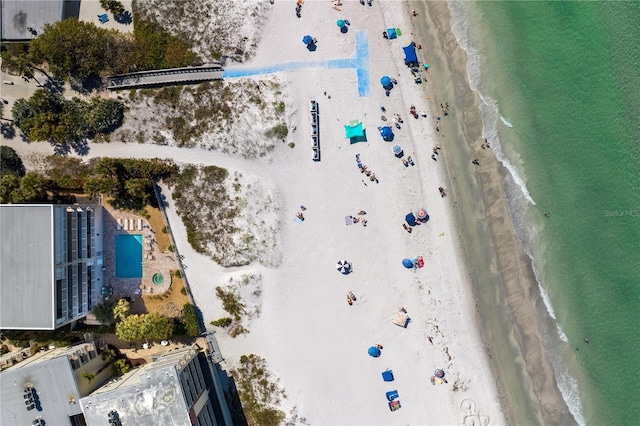 bird's eye view with a view of the beach and a water view