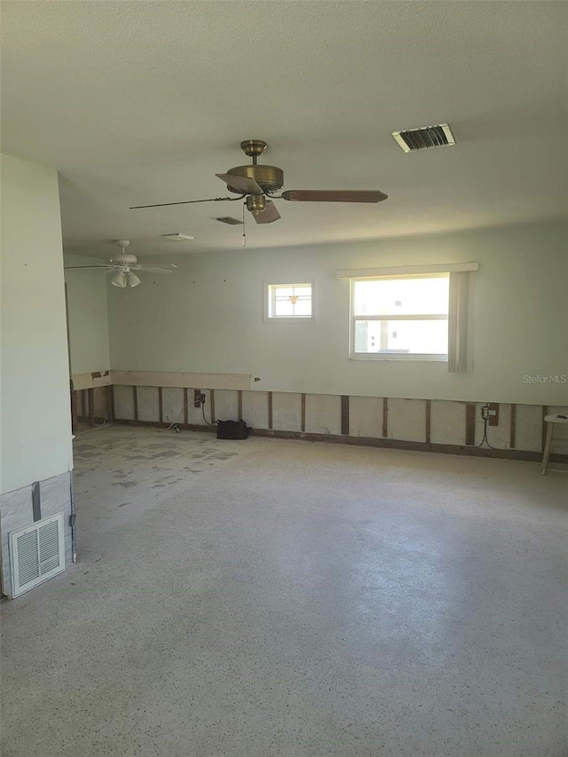 5105 Bonito Dr, New Port Richey, FL 34652 - unfurnished room featuring visible vents and a ceiling fan