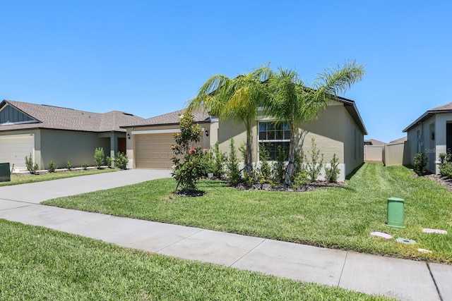 single story home featuring concrete driveway, an attached garage, stucco siding, and a front yard