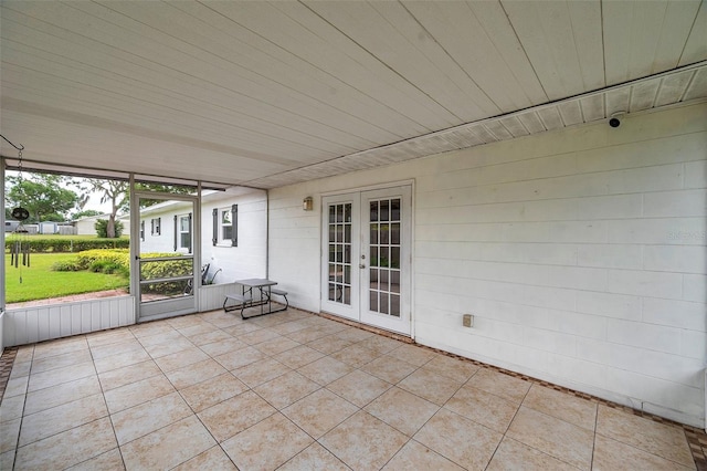 424 Forest Glen Ave, Lakeland, FL 33813 - unfurnished sunroom featuring french doors