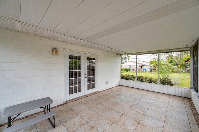 424 Forest Glen Ave, Lakeland, FL 33813 - unfurnished sunroom featuring french doors