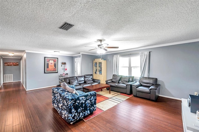 424 Forest Glen Ave, Lakeland, FL 33813 - living area with ceiling fan, hardwood / wood-style floors, baseboards, ornamental molding, and a textured ceiling