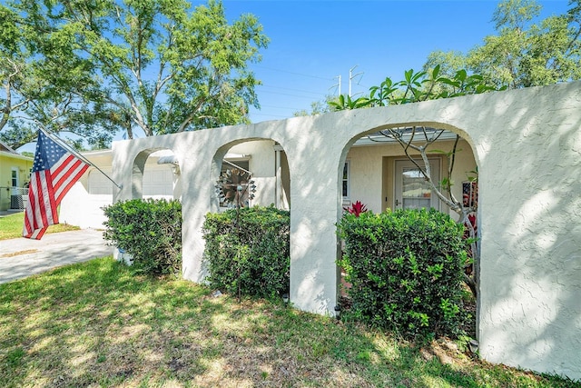 exterior space featuring stucco siding