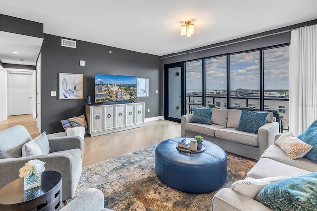 199 Dali Blvd Unit 902, Saint Petersburg, FL 33701 - living area with wood finished floors and baseboards