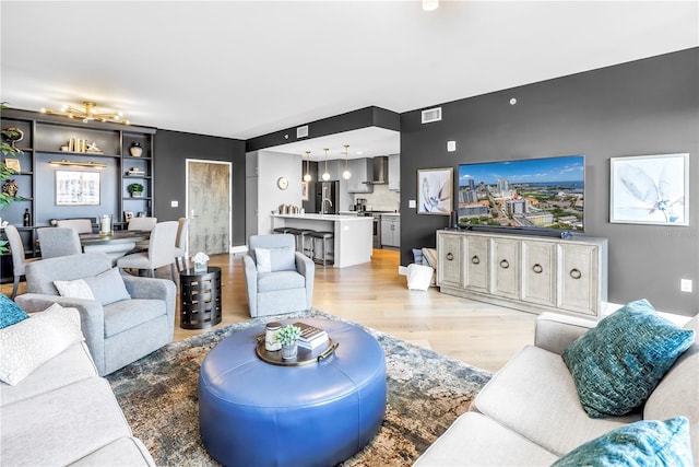 199 Dali Blvd Unit 902, Saint Petersburg, FL 33701 - living room featuring light wood-style flooring