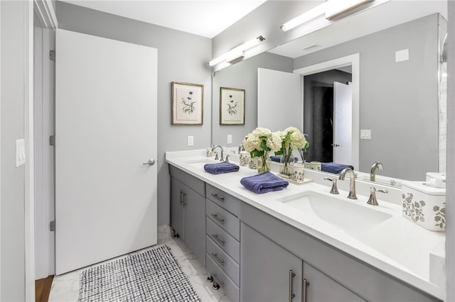 199 Dali Blvd Unit 902, Saint Petersburg, FL 33701 - bathroom featuring marble look tile flooring and double vanity