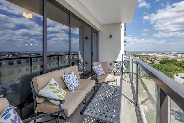 199 Dali Blvd Unit 902, Saint Petersburg, FL 33701 - balcony with outdoor lounge area and a water view